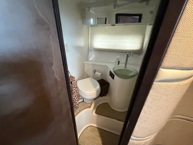  Yacht Photos Pics Luxurious bathroom in a 2016 Cobalt A40 boat.