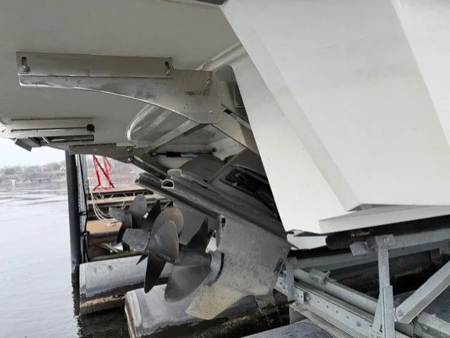  Yacht Photos Pics Rear view of a 2016 Cobalt A40 boat with propellers.