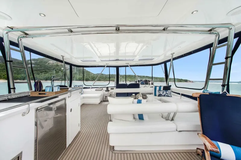 Deep Blue Yacht Photos Pics Luxurious interior of 2016 Leopard 58 Catamaran with elegant seating and ocean view.
