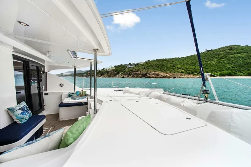 Deep Blue Yacht Photos Pics Luxurious 2016 Leopard 58 Catamaran with scenic ocean and island view.