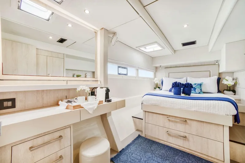 Deep Blue Yacht Photos Pics Luxurious interior of 2016 Leopard 58 Catamaran with elegant bedroom and modern amenities.