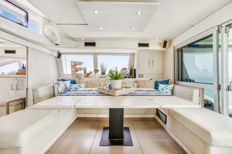 Deep Blue Yacht Photos Pics Luxurious interior of 2016 Leopard 58 Catamaran with elegant seating and decor.