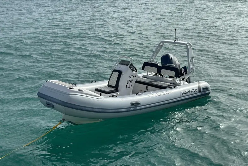 Deep Blue Yacht Photos Pics Inflatable boat on water, associated with 2016 Leopard 58 Catamaran.