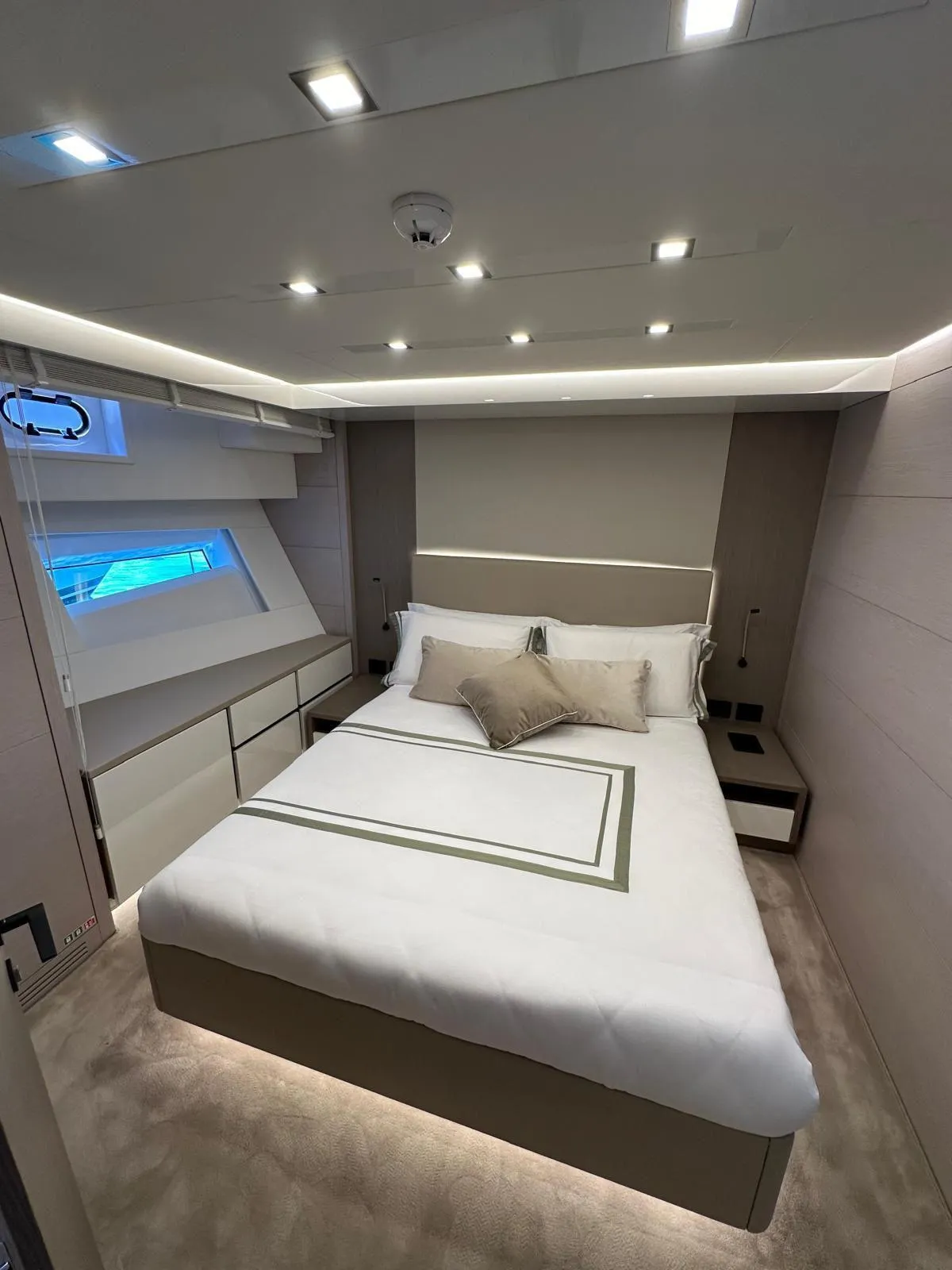 Luxurious 2024 AB 80 yacht bedroom with modern design and ambient lighting.