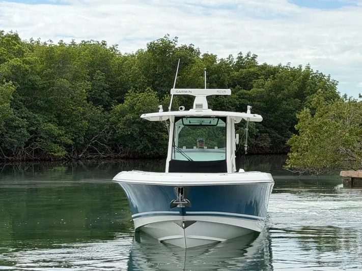  Yacht Photos Pics 2019 Boston Whaler 350 Outrage on calm water near mangroves.