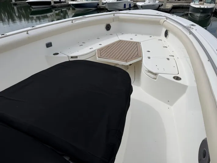  Yacht Photos Pics Boston Whaler 350 Outrage 2019, spacious deck with wood accents.
