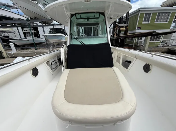  Yacht Photos Pics 2019 Boston Whaler 350 Outrage with beige outdoor seating.