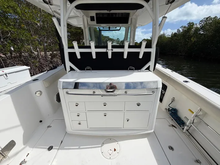  Yacht Photos Pics 2019 Boston Whaler 350 Outrage interior with storage and rod holders.
