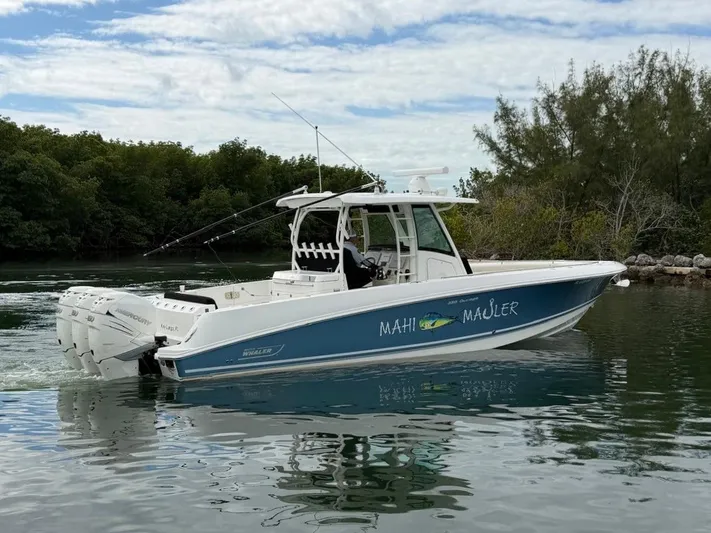  Yacht Photos Pics 2019 Boston Whaler 350 Outrage on calm waters.