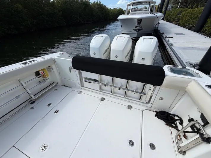  Yacht Photos Pics 2019 Boston Whaler 350 Outrage boat docked with triple engines.