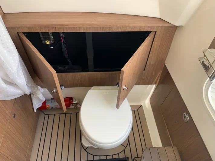  Yacht Photos Pics Interior of 2019 Boston Whaler 350 Outrage with toilet and storage.