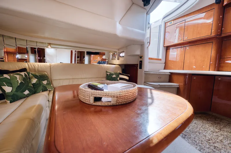 Couples Therapy Yacht Photos Pics Luxurious interior of 2001 Sea Ray 510 Sundancer yacht with elegant wood finishes.