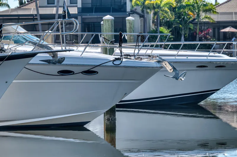 Couples Therapy Yacht Photos Pics 2001 Sea Ray 510 Sundancer yachts docked in a serene marina setting.