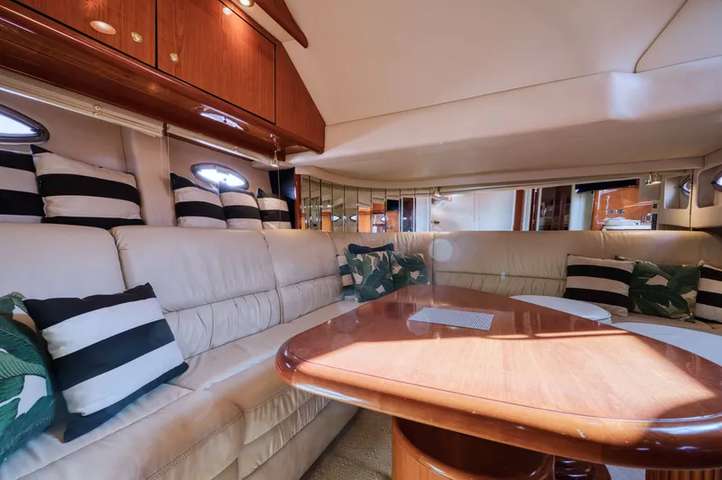 Couples Therapy Yacht Photos Pics Luxurious interior of 2001 Sea Ray 510 Sundancer yacht with plush seating and elegant decor.