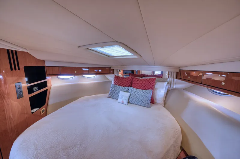 Couples Therapy Yacht Photos Pics Luxurious cabin interior of 2001 Sea Ray 510 Sundancer yacht with plush bedding.