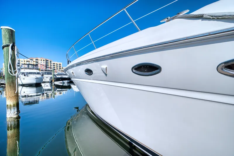 Couples Therapy Yacht Photos Pics 2001 Sea Ray 510 Sundancer yacht docked in a marina under clear blue skies.