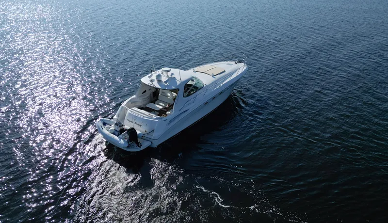 Couples Therapy Yacht Photos Pics 2001 Sea Ray 510 Sundancer yacht cruising on open water.