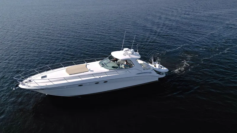 Couples Therapy Yacht Photos Pics 2001 Sea Ray 510 Sundancer yacht cruising on open water.