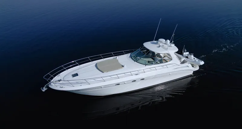 Couples Therapy Yacht Photos Pics 2001 Sea Ray 510 Sundancer yacht cruising on calm waters.
