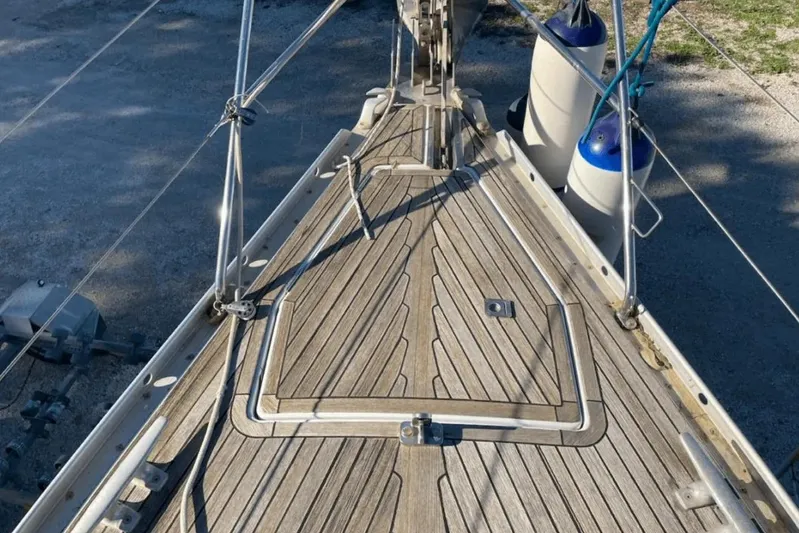  Yacht Photos Pics Bow of 2003 Cantiere del Pardo Grand Soleil 43 sailboat with teak deck and rigging.
