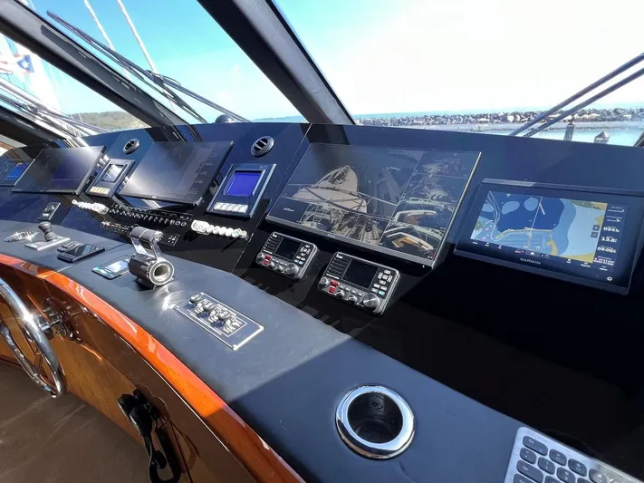  Yacht Photos Pics Control panel of a 2004 Bertram 670 yacht with advanced navigation systems.