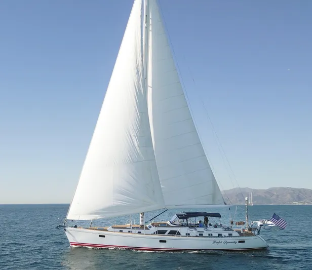 Perfect Symmetry Yacht Photos Pics Sailing yacht Hylas 70, 2006 model, cruising on open water.