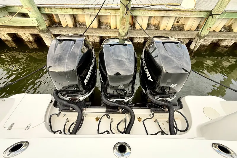  Yacht Photos Pics Triple Mercury outboard engines on a 2014 Boston Whaler 345 Conquest Pilothouse.