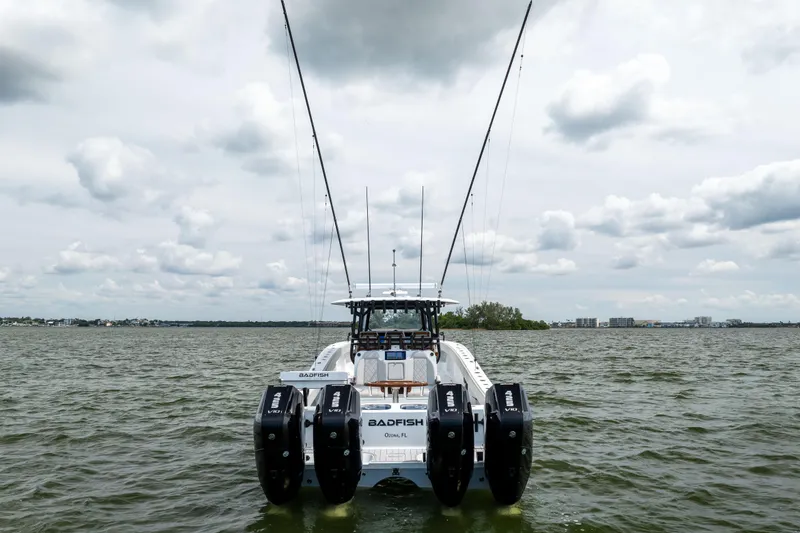  Yacht Photos Pics Freeman 42 LR 2025 boat with four engines on a cloudy day at sea.