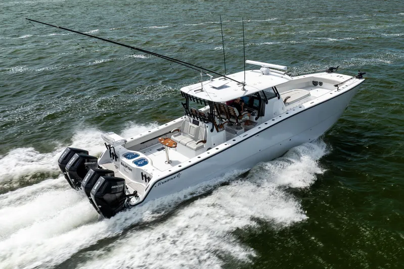  Yacht Photos Pics 2025 Freeman 42 LR boat cruising on open water with powerful engines.