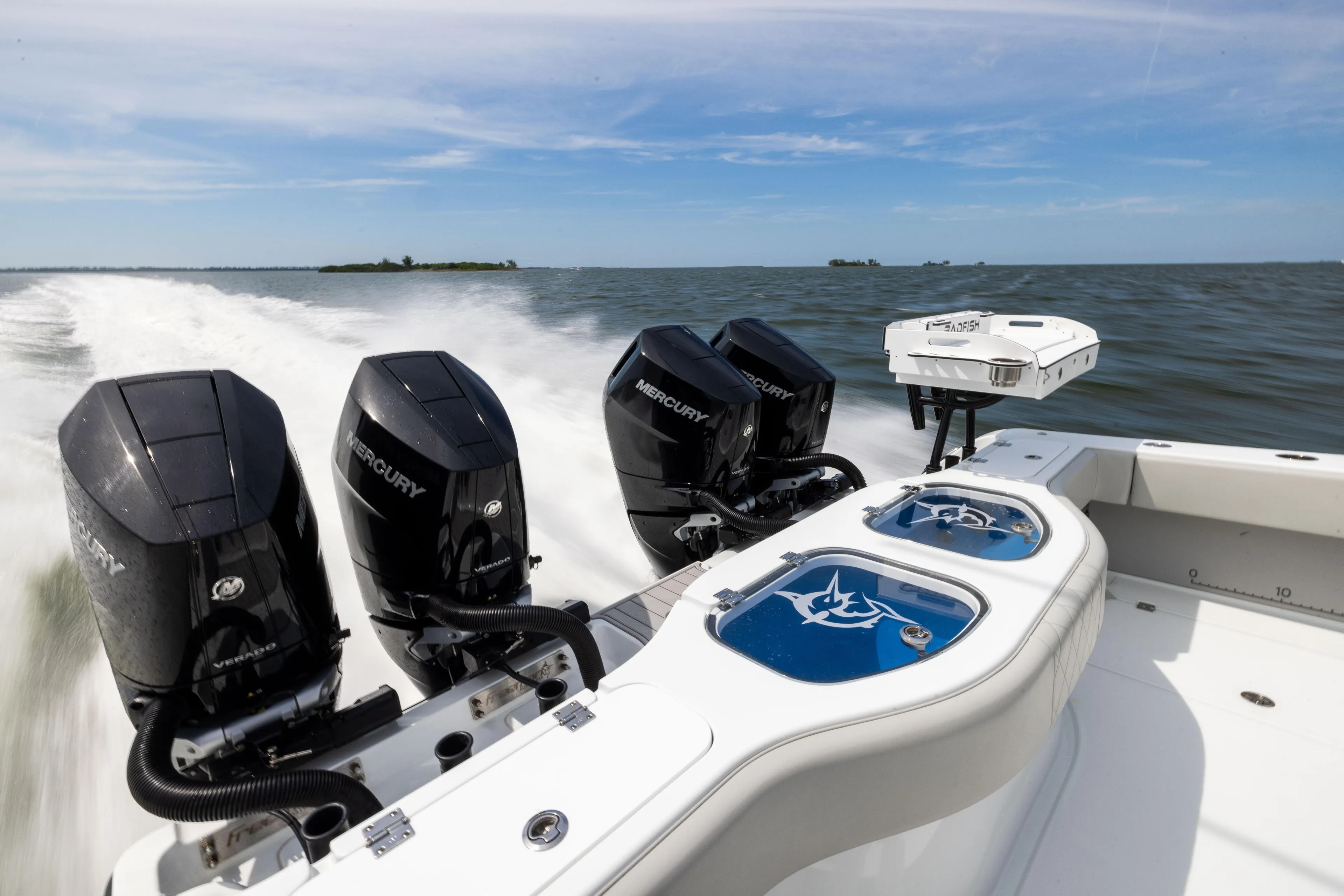  Yacht Photos Pics Freeman 42 LR 2025 boat with powerful Mercury engines cruising on open water.