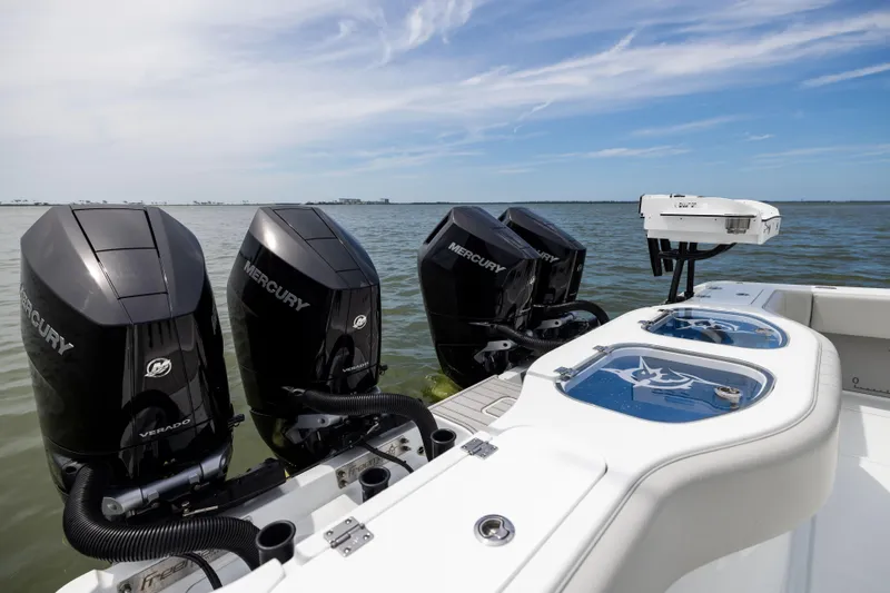  Yacht Photos Pics Freeman 42 LR 2025 boat with Mercury Verado engines on calm water.