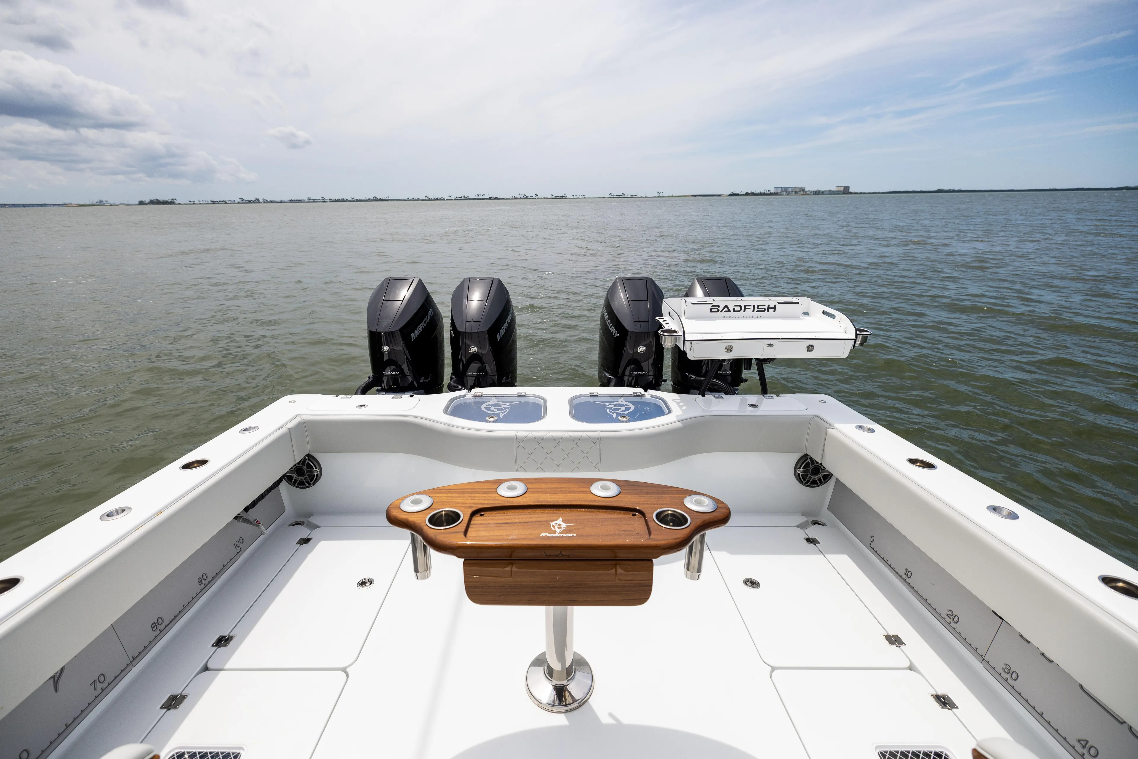  Yacht Photos Pics Freeman 42 LR 2025 boat with quad engines on open water.