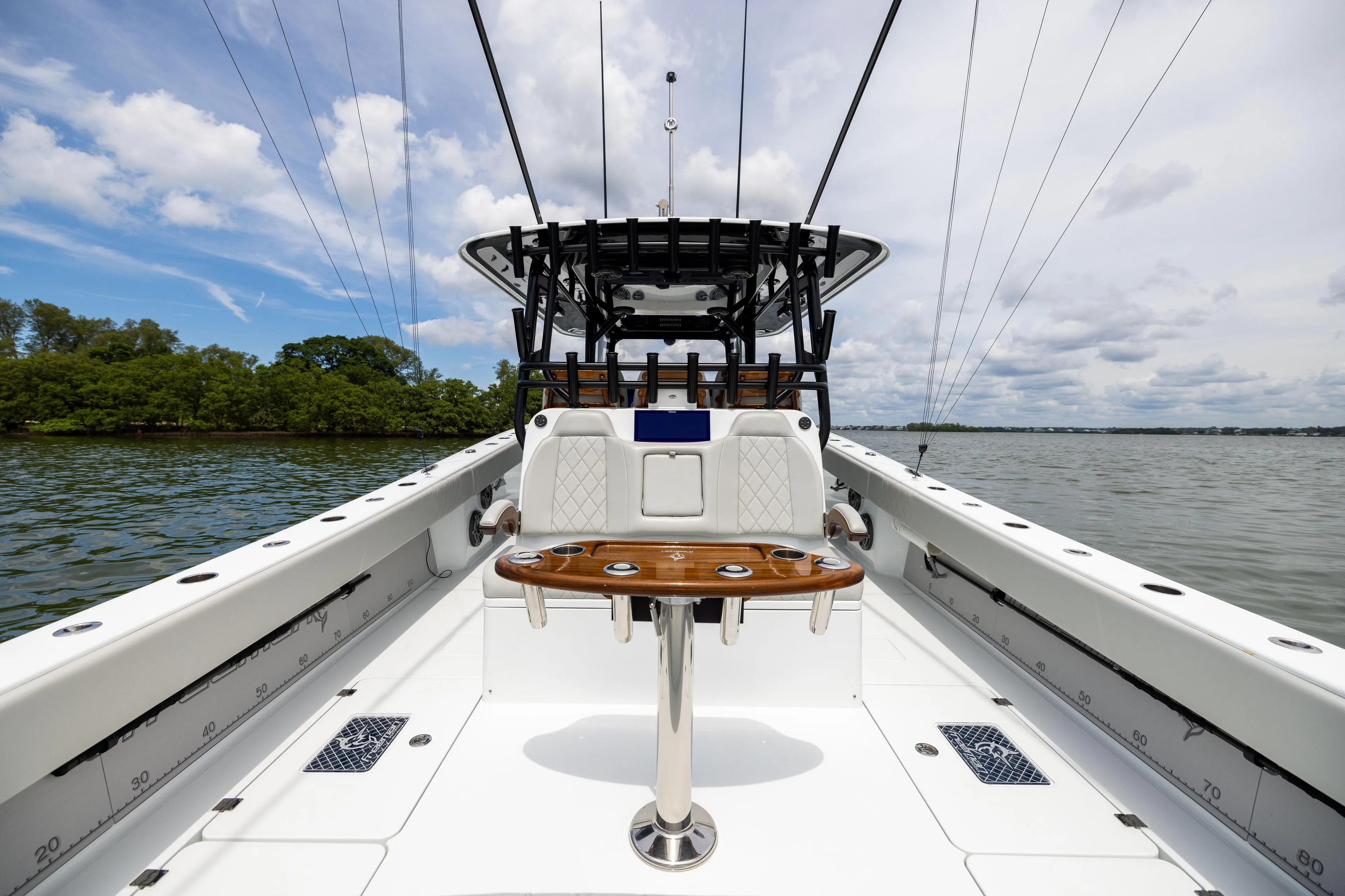  Yacht Photos Pics 2025 Freeman 42 LR boat on water, featuring sleek design and modern amenities.