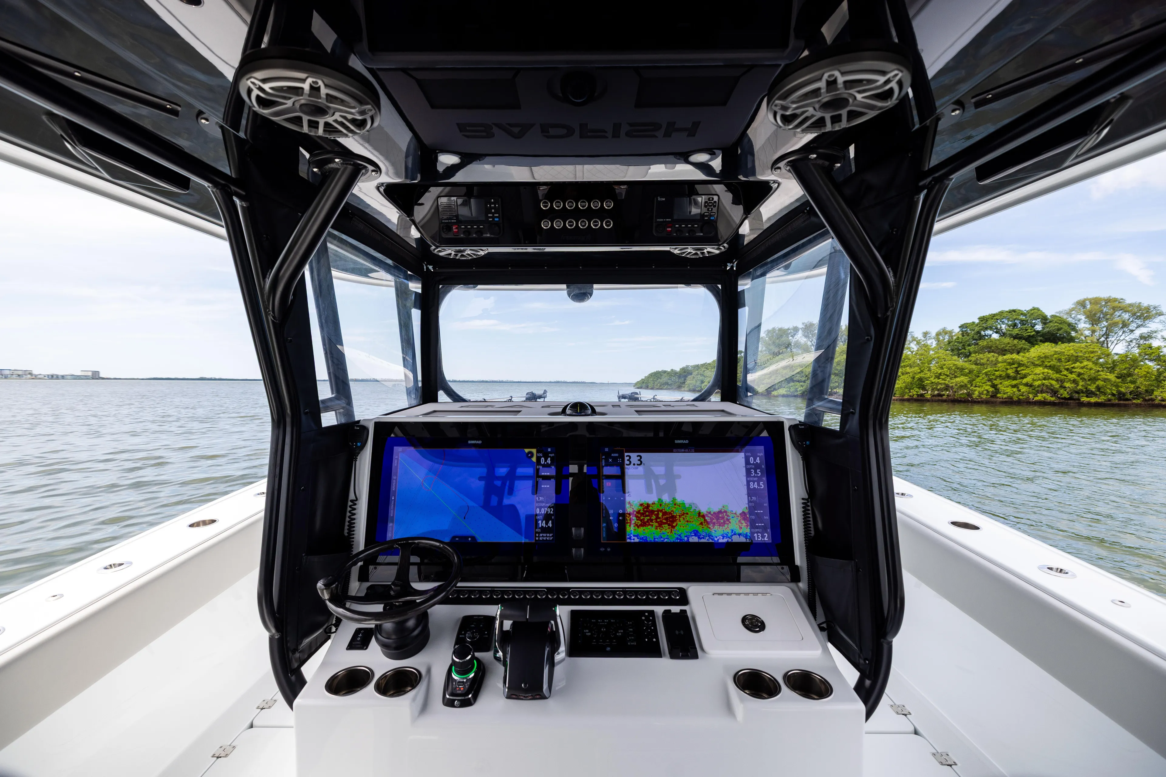  Yacht Photos Pics Interior view of 2025 Freeman 42 LR boat cockpit with advanced navigation system.