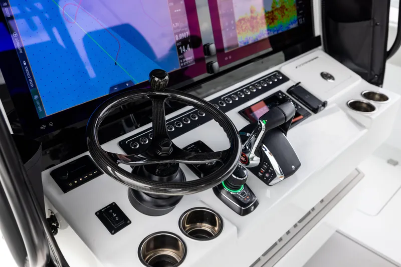  Yacht Photos Pics Control panel of 2025 Freeman 42 LR boat with advanced navigation and steering systems.