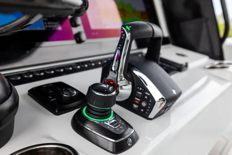  Yacht Photos Pics Control panel of 2025 Freeman 42 LR boat with joystick and throttle.
