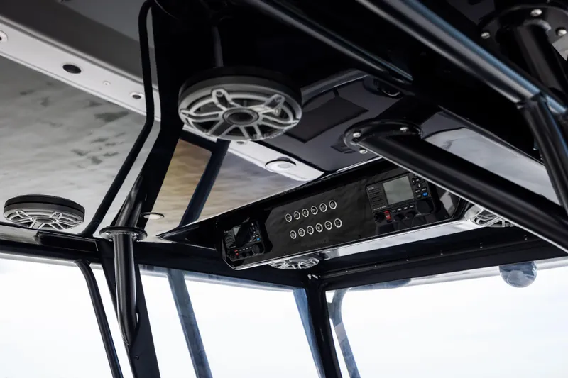  Yacht Photos Pics Interior view of 2025 Freeman 42 LR boat with advanced control panel and speakers.