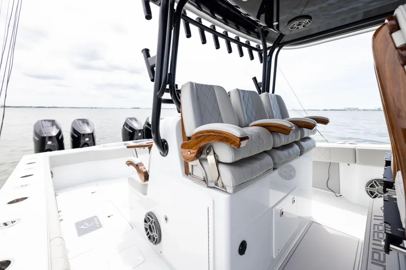  Yacht Photos Pics 2025 Freeman 42 LR boat interior with luxury seating and multiple outboard engines.