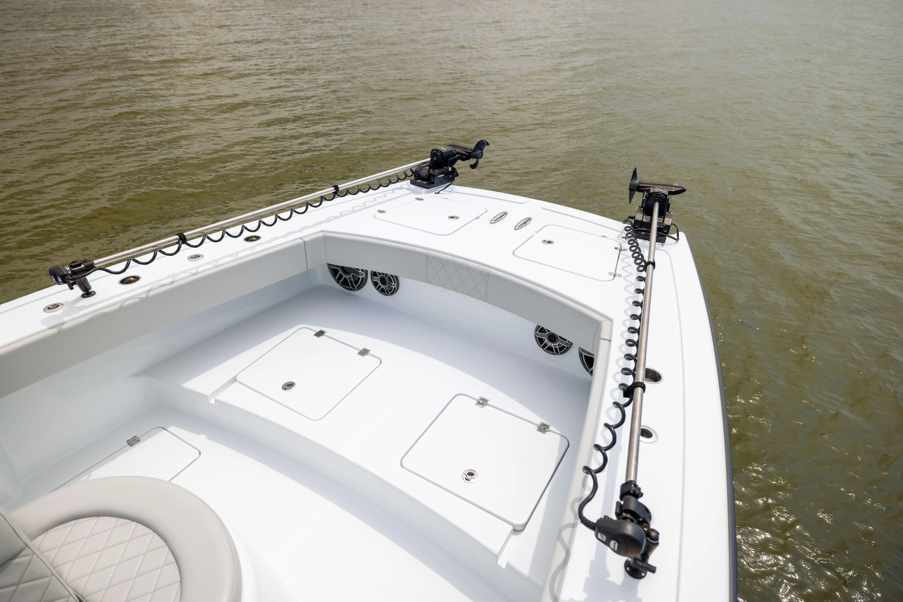  Yacht Photos Pics Bow of 2025 Freeman 42 LR boat with storage compartments and fishing rod holders.