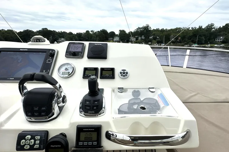 Snusie Q Yacht Photos Pics Control panel of a 2014 Prestige 450 yacht with navigation equipment.