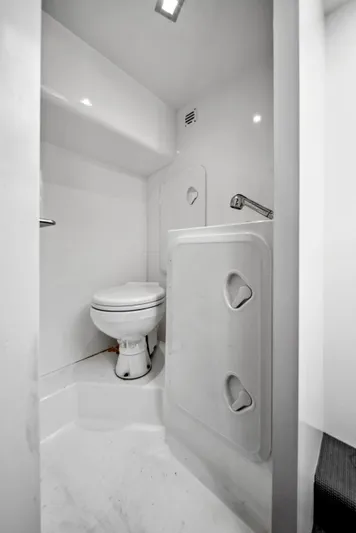  Yacht Photos Pics 2019 Galeon 560 Sky yacht bathroom with modern white fixtures.