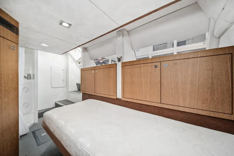  Yacht Photos Pics Luxurious cabin interior of 2019 Galeon 560 Sky yacht with wooden cabinetry.