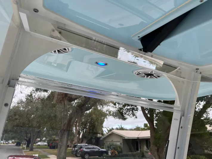  Yacht Photos Pics 2023 Cobia 280 Center Console boat with blue LED lights and speakers.