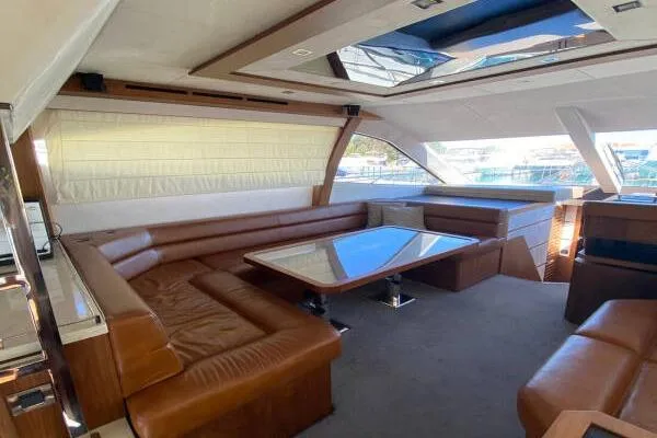  Yacht Photos Pics Luxurious interior of 2014 Galeon 550 Fly yacht with leather seating and large windows.