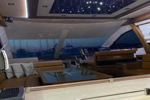  Yacht Photos Pics Luxurious interior of a 2014 Galeon 550 Fly yacht with starry ceiling.