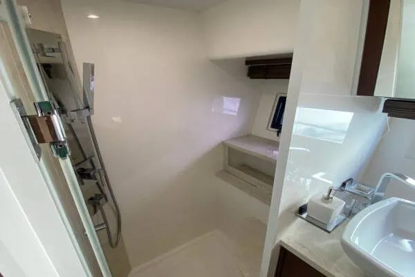  Yacht Photos Pics Luxurious bathroom in 2014 Galeon 550 Fly yacht with modern fixtures and sleek design.