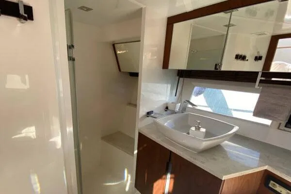  Yacht Photos Pics Bathroom interior of 2014 Galeon 550 Fly yacht with modern sink and mirror.