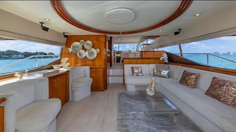 Lumar Yacht Photos Pics Luxurious interior of 2005 Ferretti Yachts 680 with elegant seating and decor.