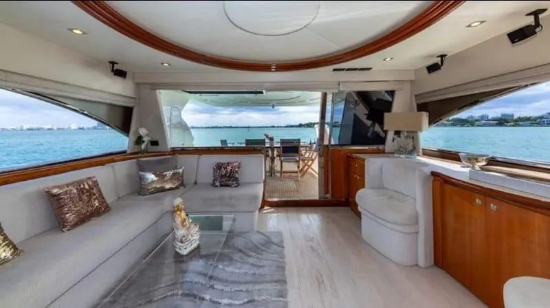 Lumar Yacht Photos Pics Luxurious interior of 2005 Ferretti Yachts 680 with ocean view and elegant furnishings.