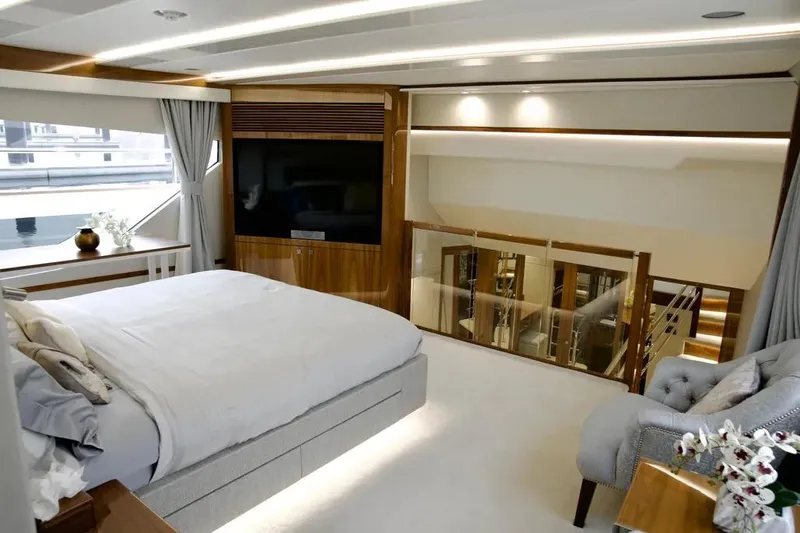  Yacht Photos Pics Luxurious 2018 Sunseeker 95 yacht bedroom with elegant decor and modern amenities.